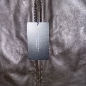 Andrew Marc Leather jacket. Size small Dark brown. New with tags.